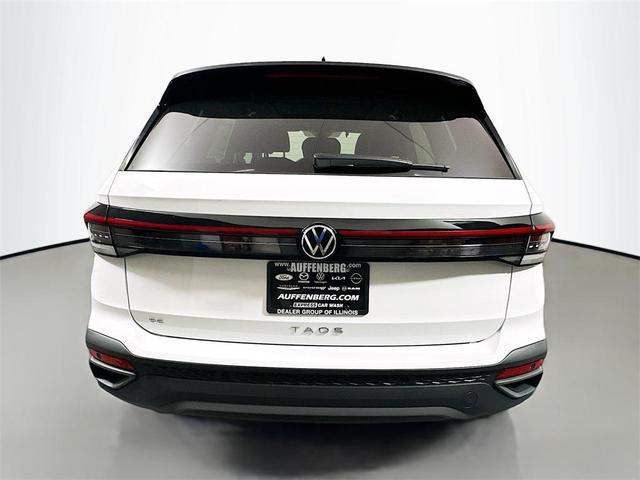 Photo of 2025 Pure White W/Black Roof Volkswagen Taos
