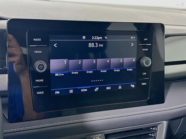 Photo of 2025 Pure White W/Black Roof Volkswagen Taos