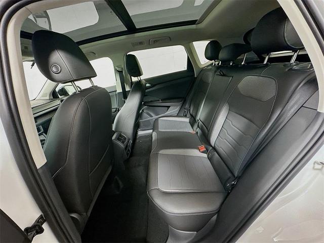 Photo of 2025 Pure White W/Black Roof Volkswagen Taos