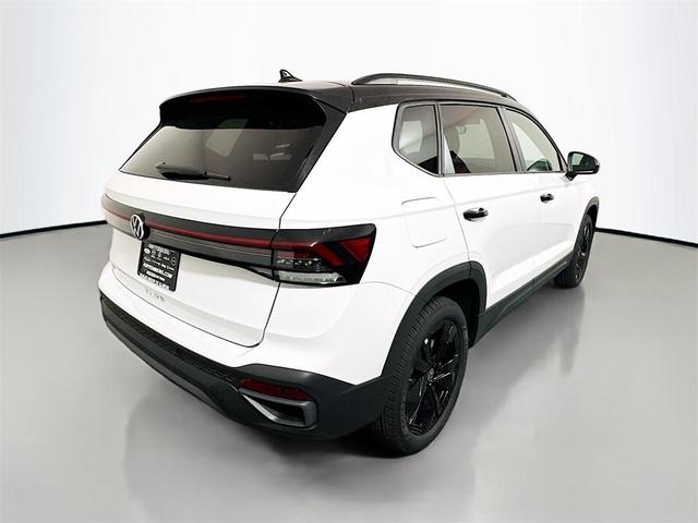 Photo of 2025 Pure White W/Black Roof Volkswagen Taos