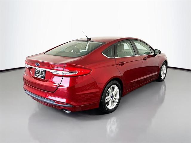 Photo of 2018 Ruby Red Metallic Tinted Clearcoat Ford Fusion