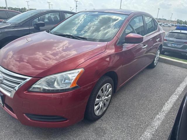 Photo of 2015 Cayenne Red Nissan Sentra