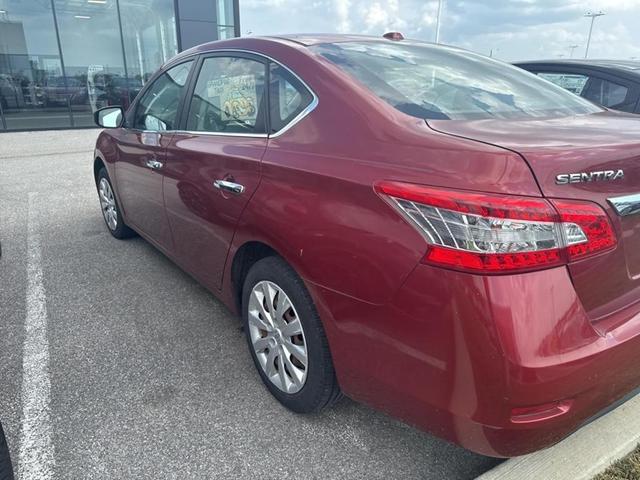 Photo of 2015 Cayenne Red Nissan Sentra