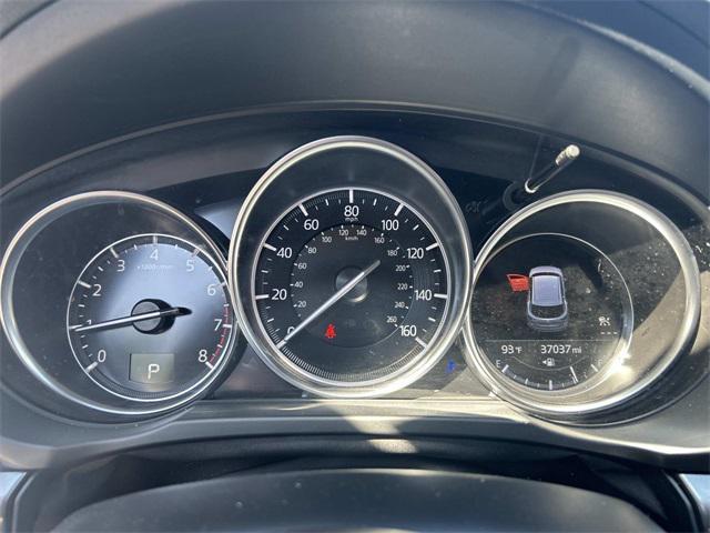 Photo of 2024 Jet Black Mazda CX-5