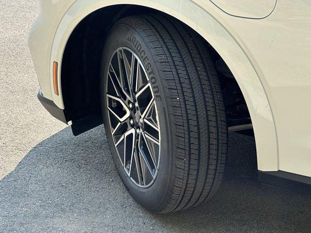 Photo of 2025 STAR WHITE MET Ford Mustang Mach-E