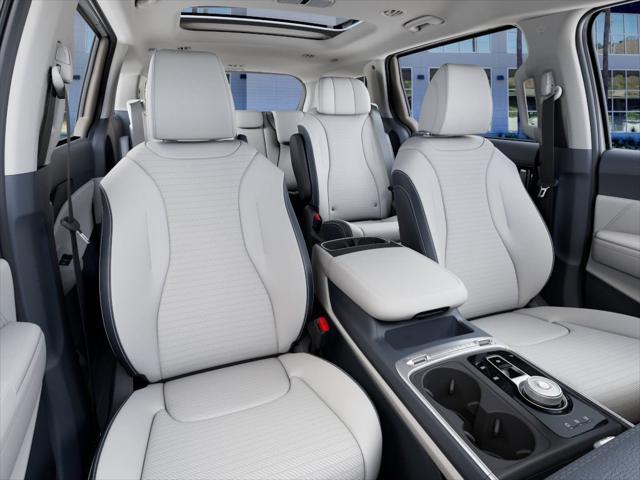 Photo of 2026 Snow White Pearl Kia Carnival Hybrid