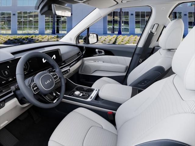 Photo of 2026 Snow White Pearl Kia Carnival Hybrid
