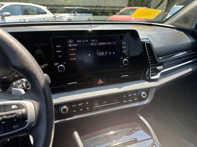 Photo of 2023 Gravity Gray Kia Sportage Hybrid