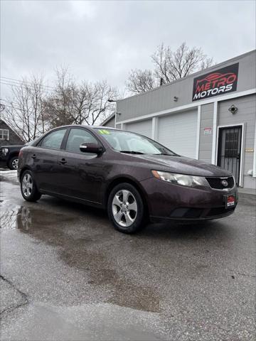 Photo of 2010 Burgundy Kia Forte