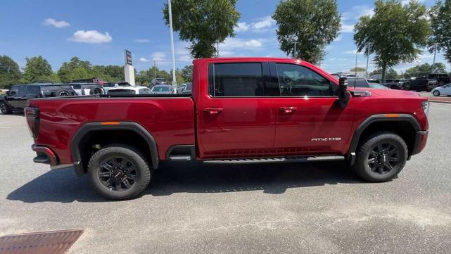 Photo of 2025 Volcanic Red Tintcoat GMC Sierra 2500