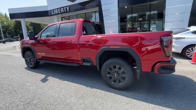 Photo of 2025 Volcanic Red Tintcoat GMC Sierra 2500