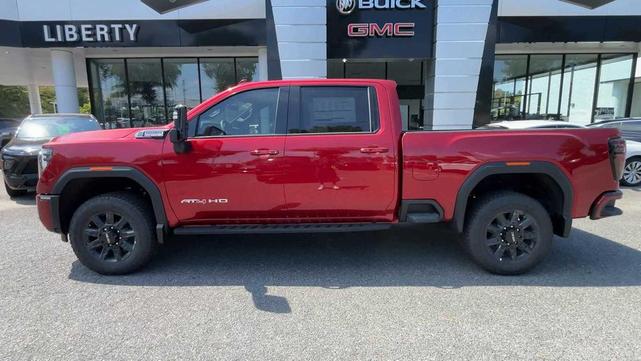 Photo of 2025 Volcanic Red Tintcoat GMC Sierra 2500
