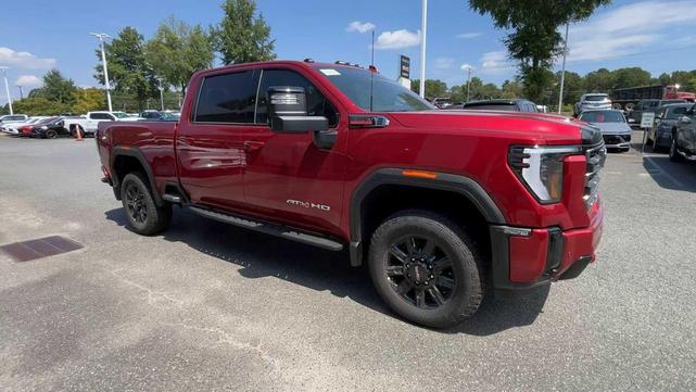 Photo of 2025 Volcanic Red Tintcoat GMC Sierra 2500