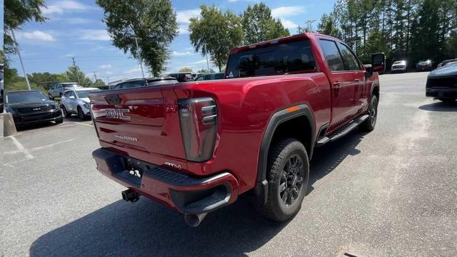 Photo of 2025 Volcanic Red Tintcoat GMC Sierra 2500