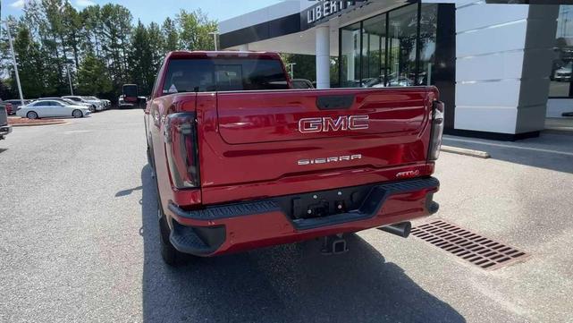 Photo of 2025 Volcanic Red Tintcoat GMC Sierra 2500