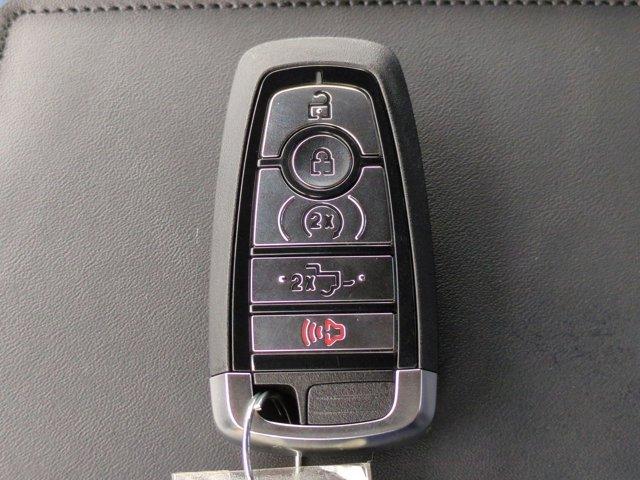 Photo of 2025 Ruby Red Metallic Tinted Clearcoat Ford F-350