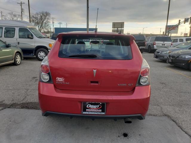 Photo of 2009 Red Pontiac Vibe