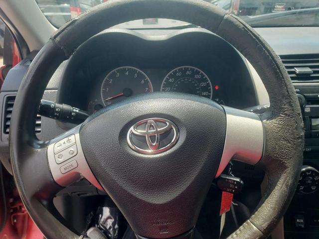 Photo of 2009 Barcelona Red Metallic Toyota Corolla