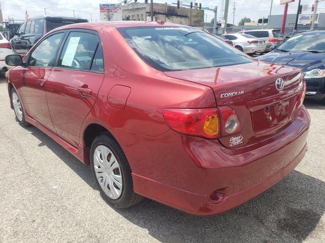Photo of 2009 Barcelona Red Metallic Toyota Corolla