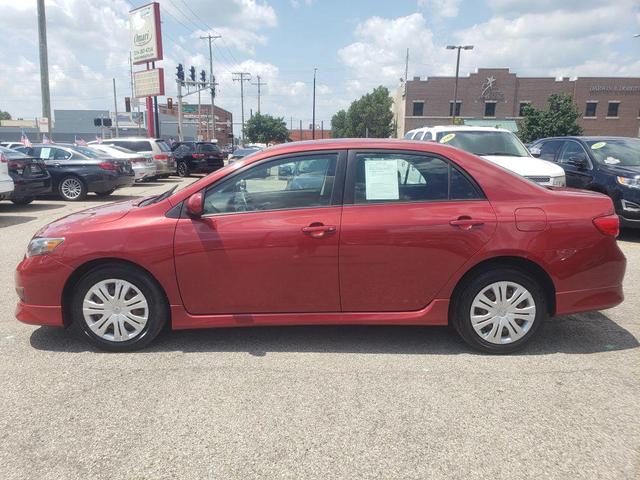 Photo of 2009 Barcelona Red Metallic Toyota Corolla