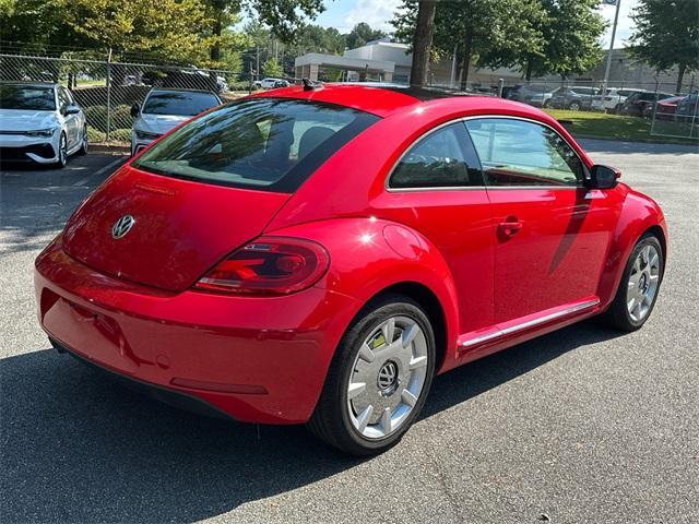 Photo of 2013 Tornado Red Volkswagen Beetle