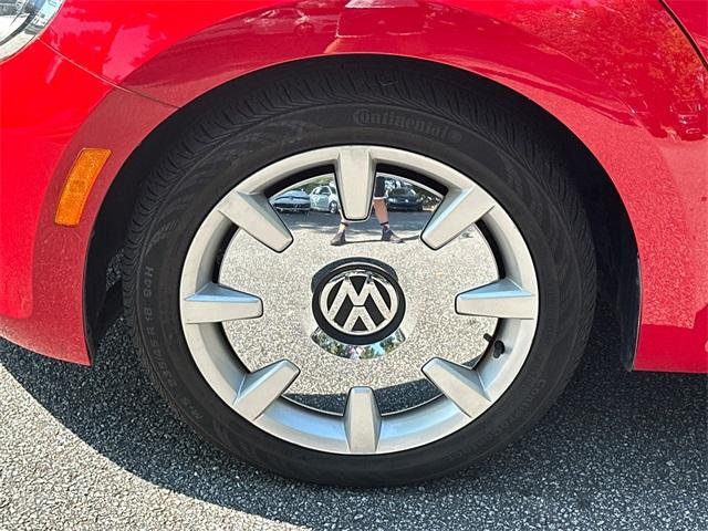 Photo of 2013 Tornado Red Volkswagen Beetle