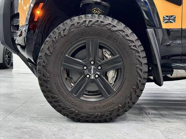 Photo of 2022 Santorini Black Metallic Land Rover Defender