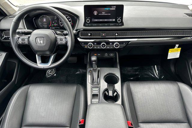 Photo of 2024 Platinum White Pearl Honda Civic
