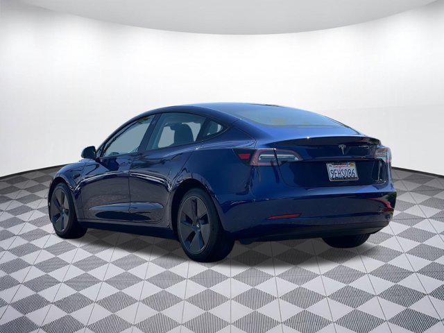 Photo of 2023 Deep Blue Metallic Tesla Model 3