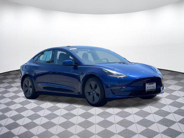 Photo of 2023 Deep Blue Metallic Tesla Model 3