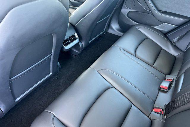 Photo of 2023 Deep Blue Metallic Tesla Model 3