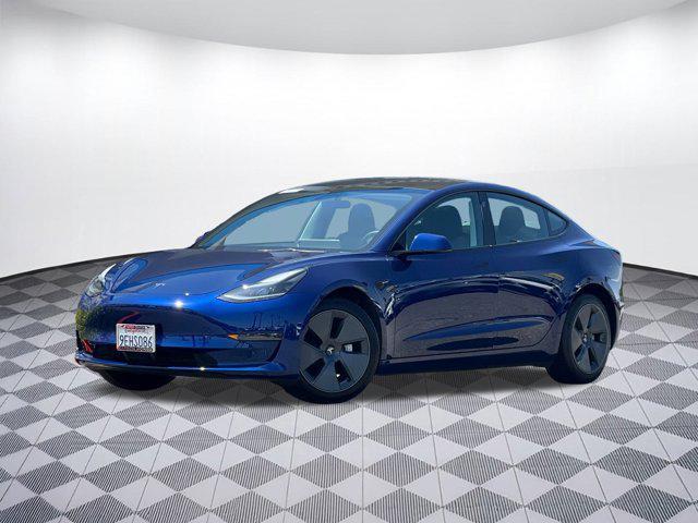 Photo of 2023 Deep Blue Metallic Tesla Model 3