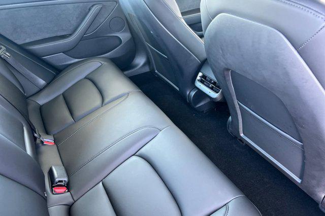 Photo of 2023 Deep Blue Metallic Tesla Model 3