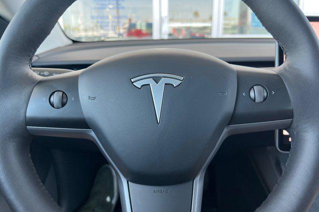 Photo of 2023 Deep Blue Metallic Tesla Model 3