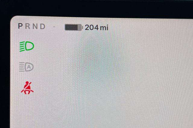 Photo of 2023 Deep Blue Metallic Tesla Model 3