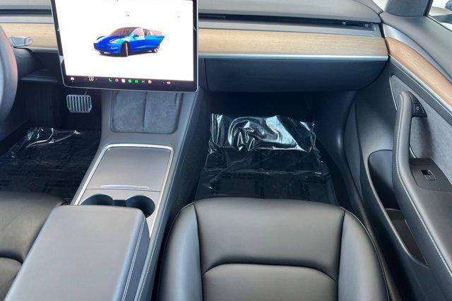 Photo of 2023 Deep Blue Metallic Tesla Model 3