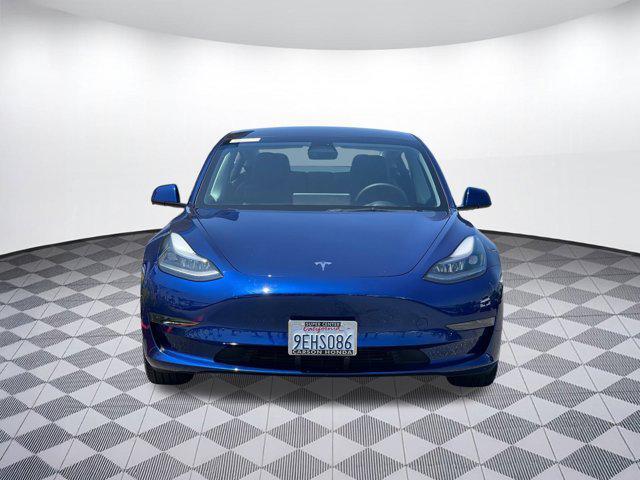 Photo of 2023 Deep Blue Metallic Tesla Model 3