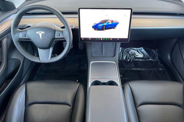 Photo of 2023 Deep Blue Metallic Tesla Model 3