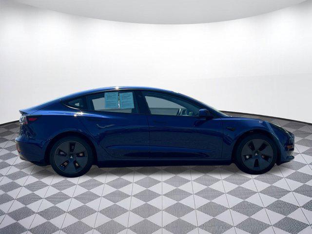Photo of 2023 Deep Blue Metallic Tesla Model 3