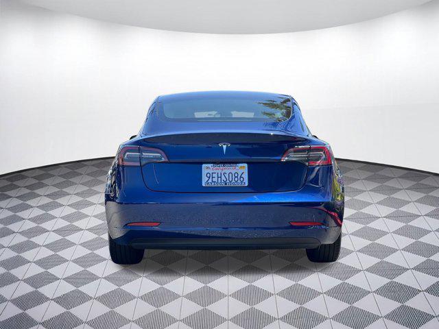 Photo of 2023 Deep Blue Metallic Tesla Model 3