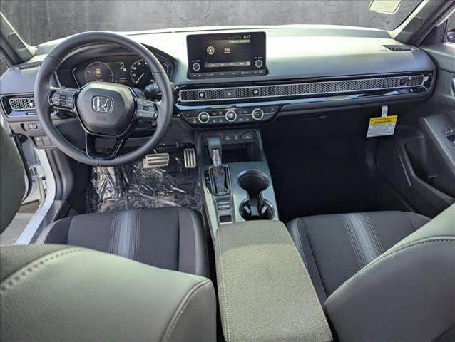 Photo of 2025 Platinum White Pearl Honda Civic Hybrid