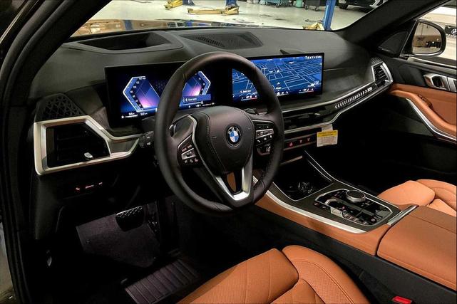 Photo of 2026 Manhattan Green Metallic BMW X5