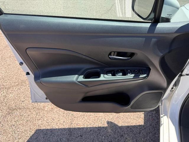 Photo of 2024 Aspen White Tricoat Nissan Versa