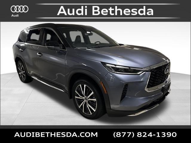 Photo of 2022 Moonbow Blue/Black Obsidian INFINITI QX60