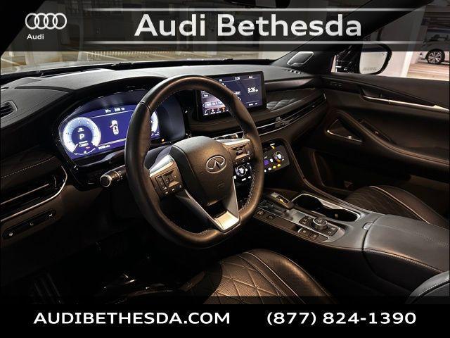 Photo of 2022 Moonbow Blue/Black Obsidian INFINITI QX60