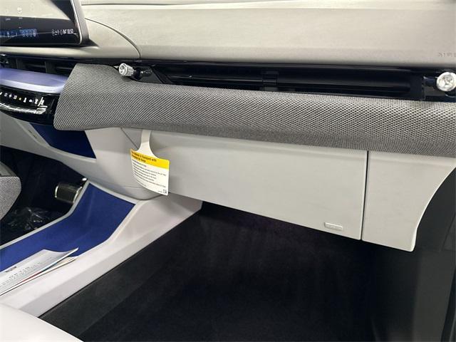 Photo of 2025 Coastal Blue Metallic Cadillac OPTIQ