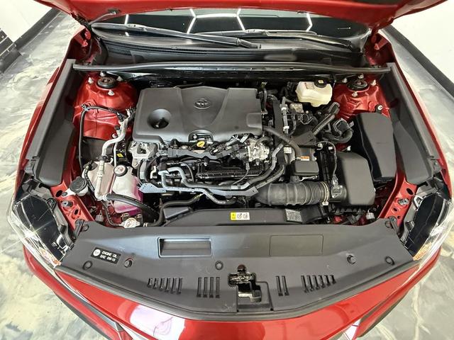 Photo of 2023 Supersonic Red Toyota Camry Hybrid
