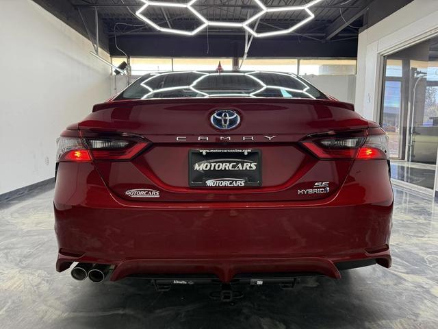 Photo of 2023 Supersonic Red Toyota Camry Hybrid