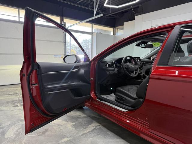Photo of 2023 Supersonic Red Toyota Camry Hybrid