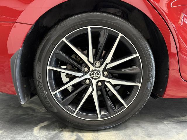 Photo of 2023 Supersonic Red Toyota Camry Hybrid